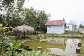 What is residential land with garden and pond?