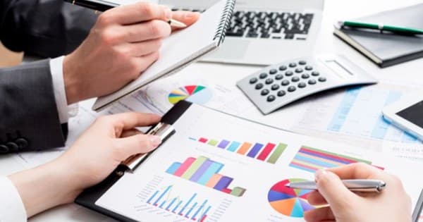 Can companies translate their accounting vouchers in a foreign language by themselves?