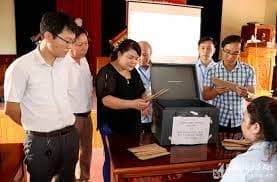 The business won a land auction, how does the business register the right to use the land?