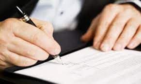 What documents does the authorized person sign on behalf of the contractor's representative?