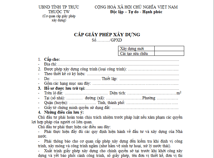 Does the construction permit application need to be accompanied by a tax receipt?