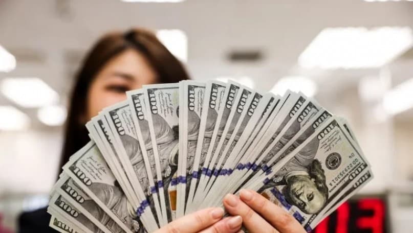 How is the USD/VND exchange rate responding to inflationary pressures?