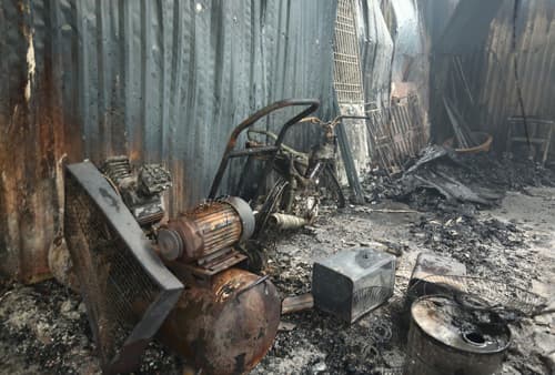 Eight die as deadly blaze guts four workshops in Hanoi