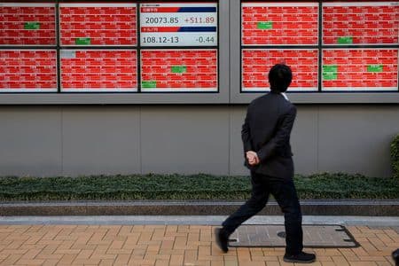 Asian shares near 9-month highs, helped by US optimism on China trade talks
