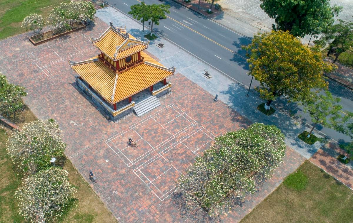 Summer flowers brighten up an imperial landscape in Vietnam