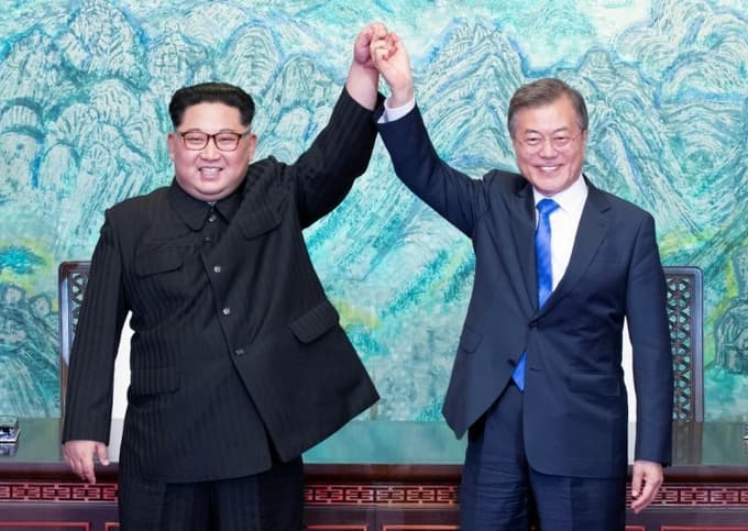 Two Koreas mark Moon-Kim summit anniversary with different tones