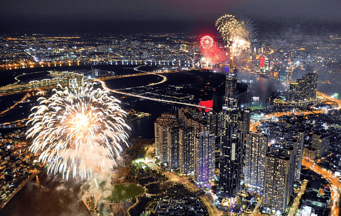 Saigon skyline dazzles to celebrate two historic days