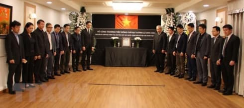 Respect-paying services held for former President around the globe