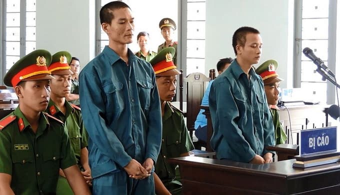 Two jailed in Vietnam for burning police cars during last year's SEZ law protests