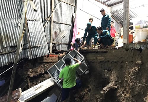 Riverside erosion sinks eight Mekong Delta houses