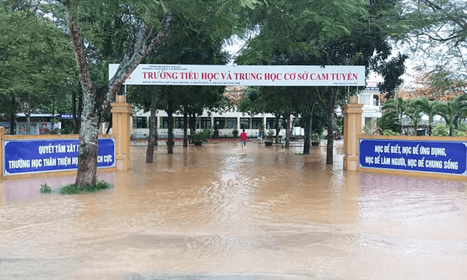 Four die in floods, landslides as rains batter central Vietnam