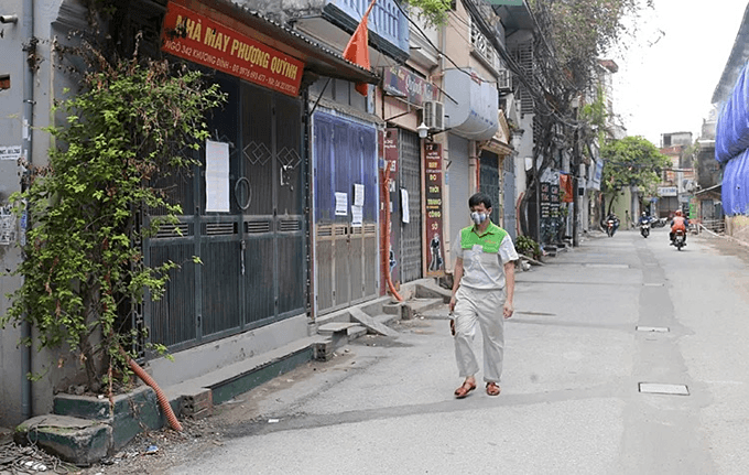 Fear, confusion stalk residential areas near site of Hanoi warehouse fire
