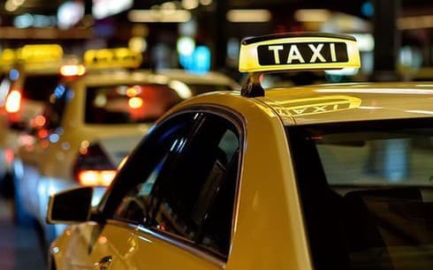 Light box sign requested for all taxis