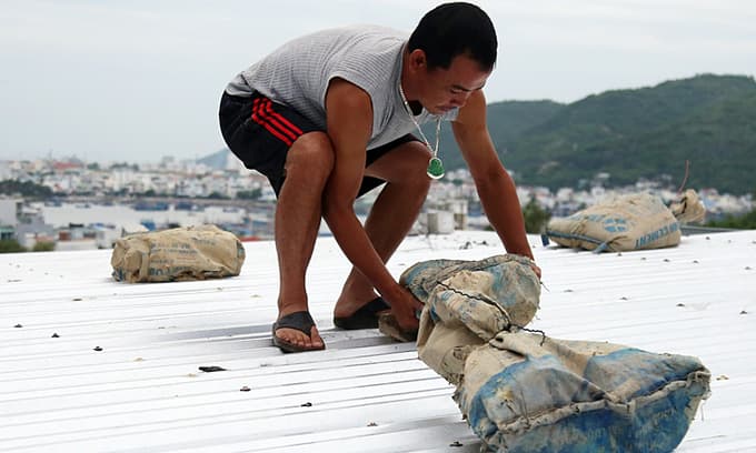 Vietnam closes airports, bans sailing as storm Matmo near