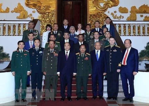Government leader hosts foreign military leaders