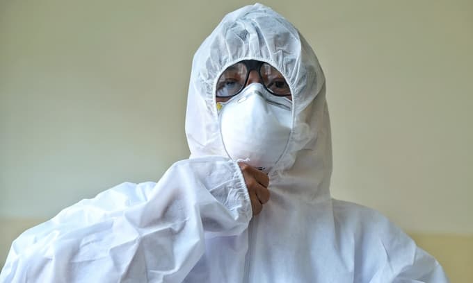 Double-digit spike sends Vietnam's Covid-19 patient tally past 100