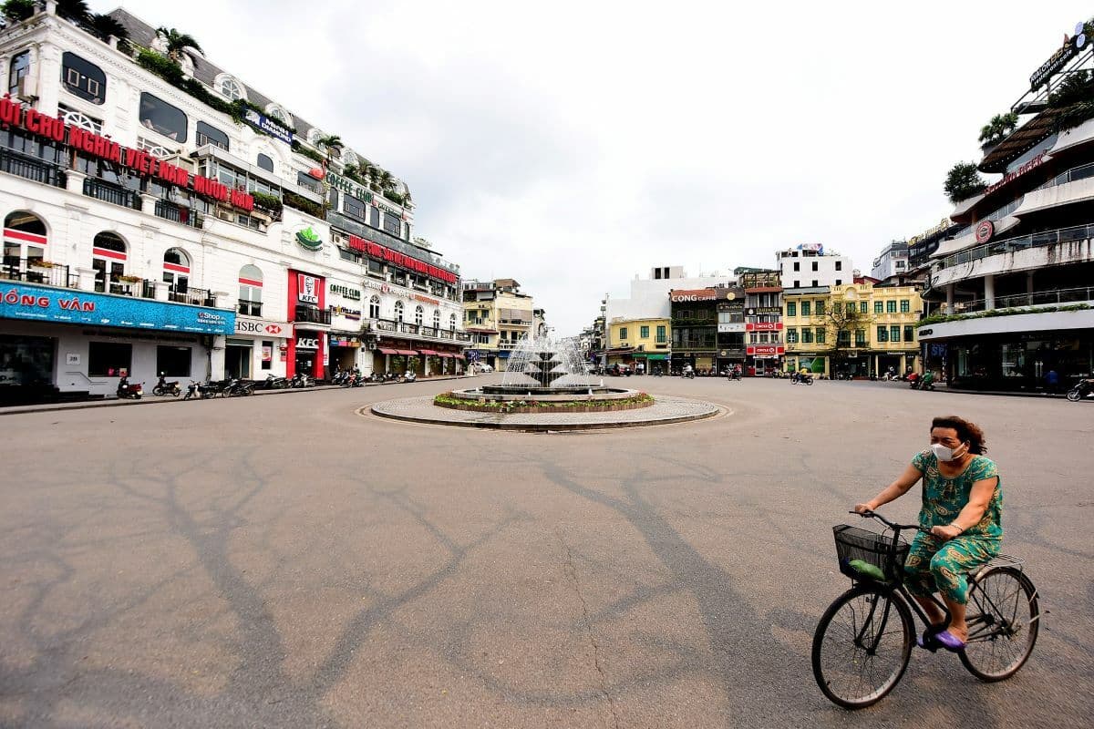 Lockdown of 'non-essential' businesses empties Hanoi streets