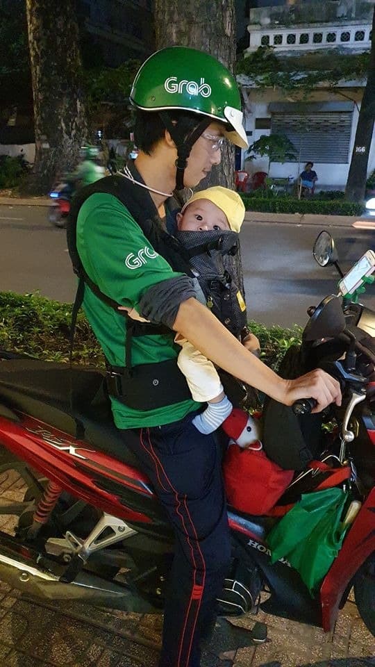 Motorbike taxi driver takes infant son along for every ride