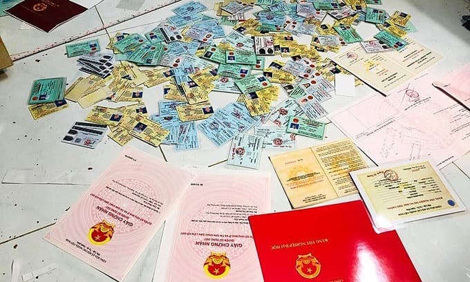 Vietnam detains 18 in hi-tech forgery probe
