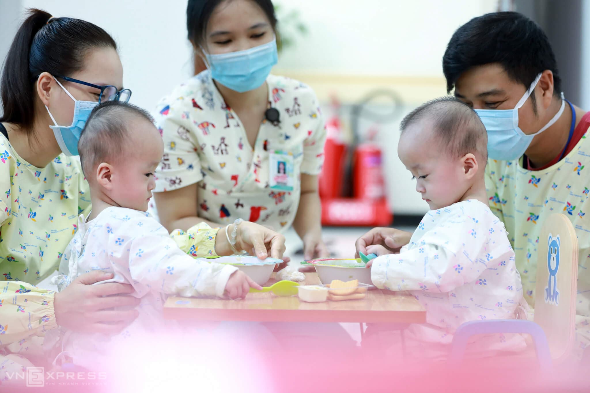 Saigonese conjoined twins embrace split life