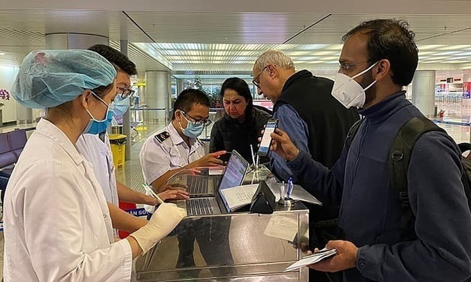 Foreigners to pay $63 minimum for Covid-19 tests