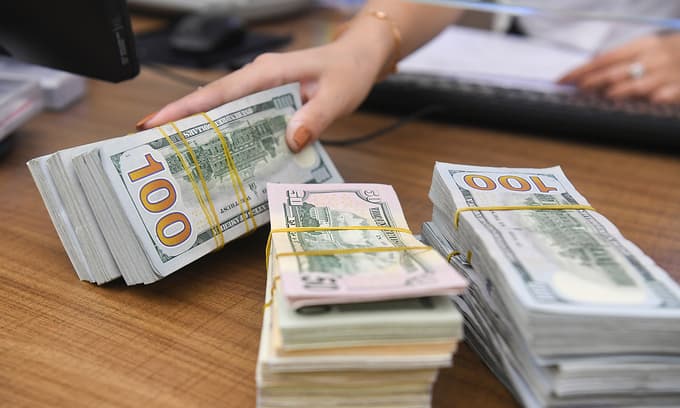 Vietnam cuts dollar buying rate for first time in 12 months