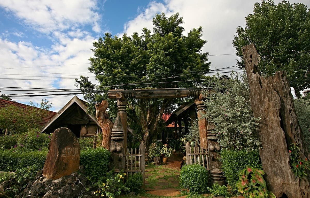 Sip on Central Highlands coffee in a traditional Ede wooden house
