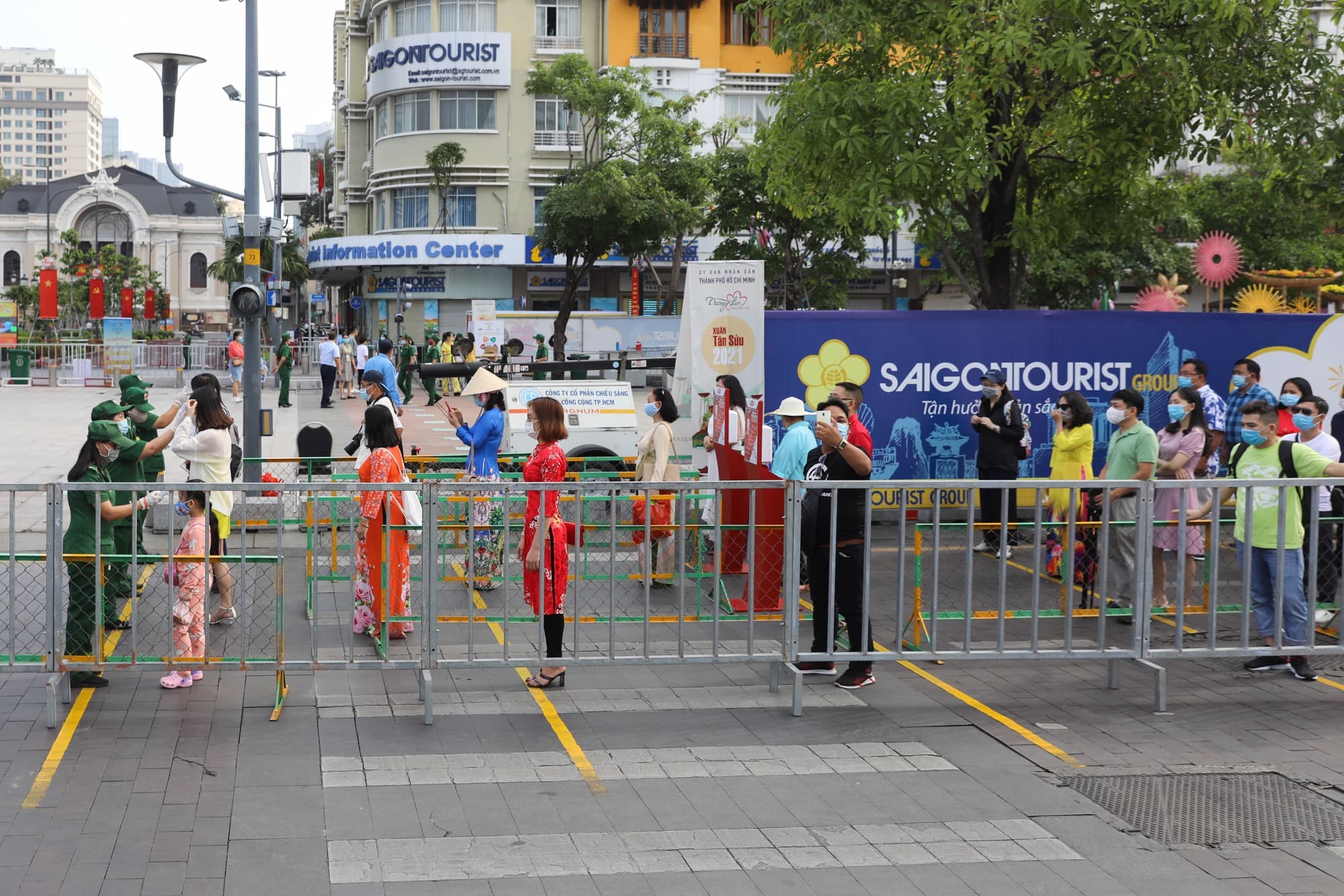 masked residents bask in unmasked beauty of flower street in saigon