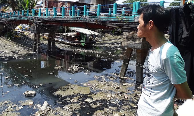 Polluted Saigon canal drives citizens to the brink after two decades