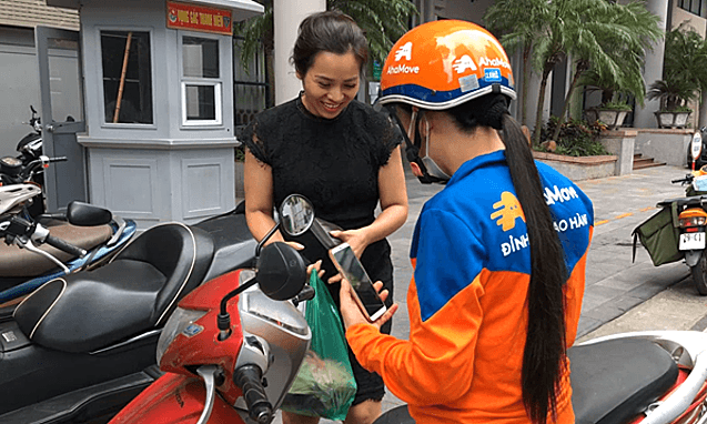 Women turn to food delivery jobs in pandemic-hit market