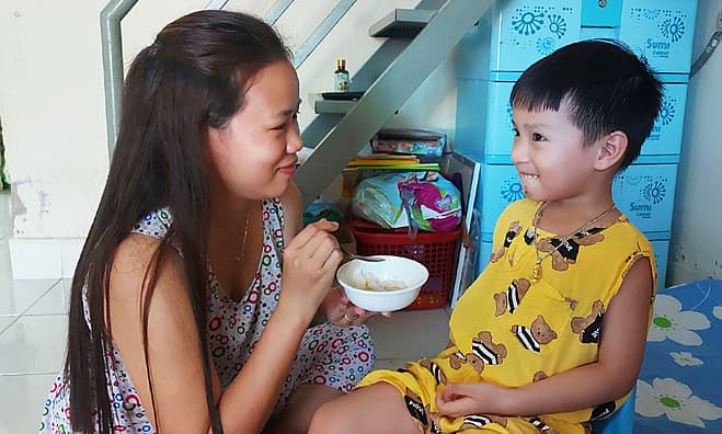 Slogging away: HCMC workers ignore overtime limits to make ends meet