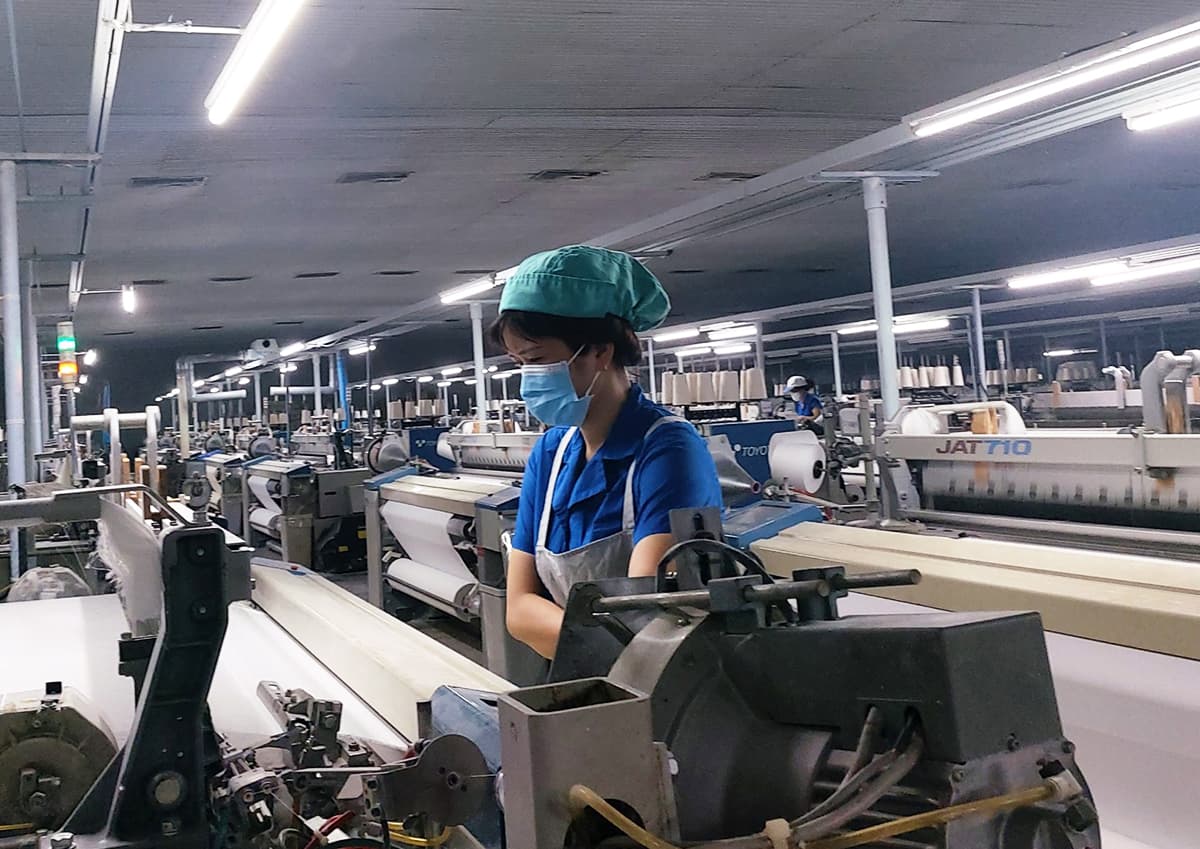 Tough choice: HCMC workers leave families, move to factories