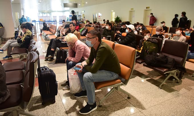 Foreigners' travel plans hit as Vietnam suspends domestic flights