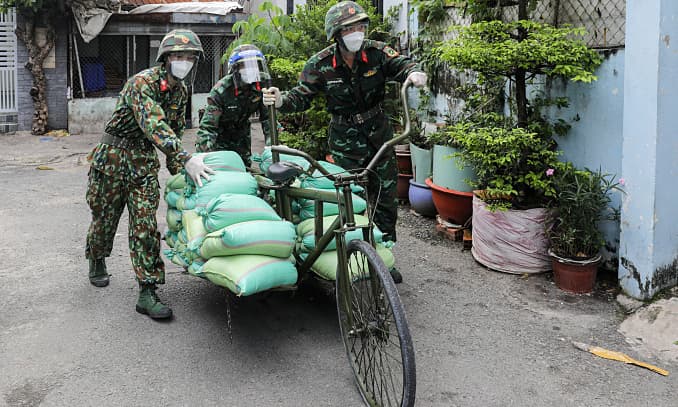 Vietnam records 9,360 new local Covid cases