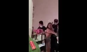 Police break into woman's apartment for Covid test