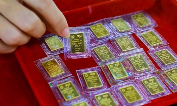 Gold price hits 12-month high