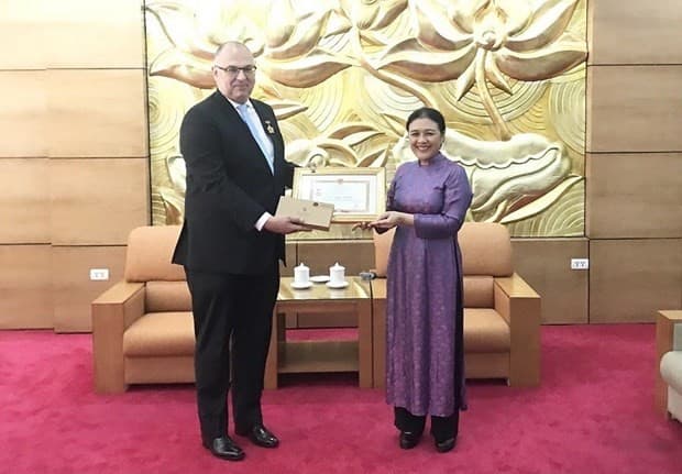 Friendship insignia bestowed upon Danish Ambassador