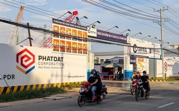 Volatile real estate market puts pressure on business results