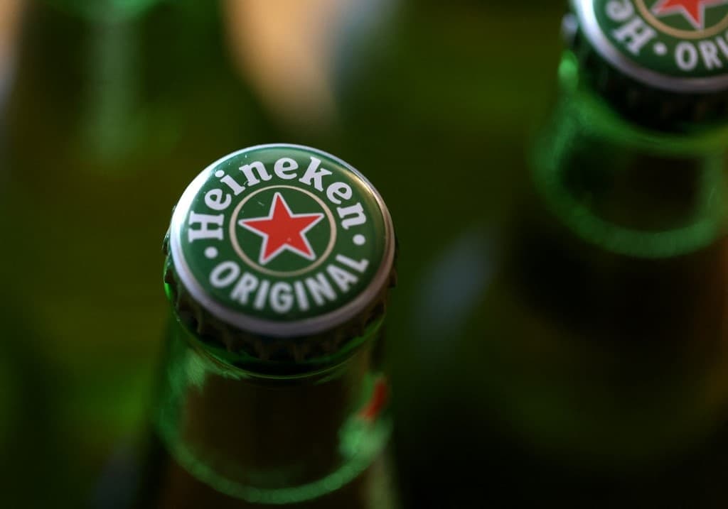Heineken profits slide as beer price hikes curb enthusiasm