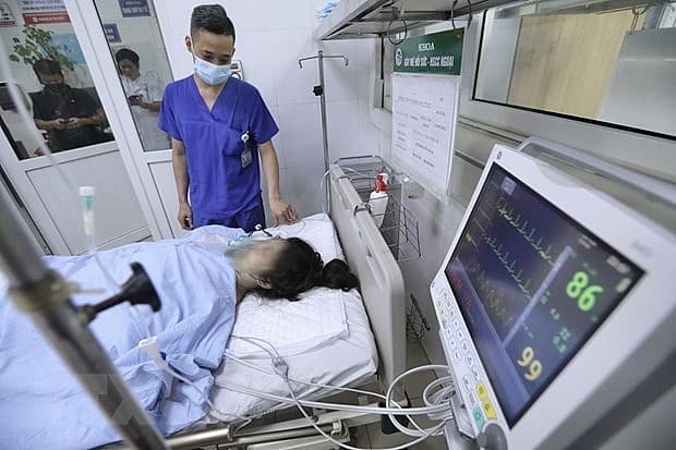 OVs support families of victims in apartment building fire in Hanoi