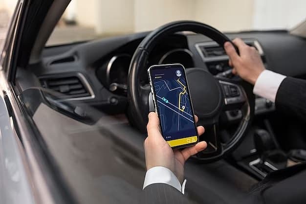 Uber, Lyft to pay $328 mn to drivers after New York state probe