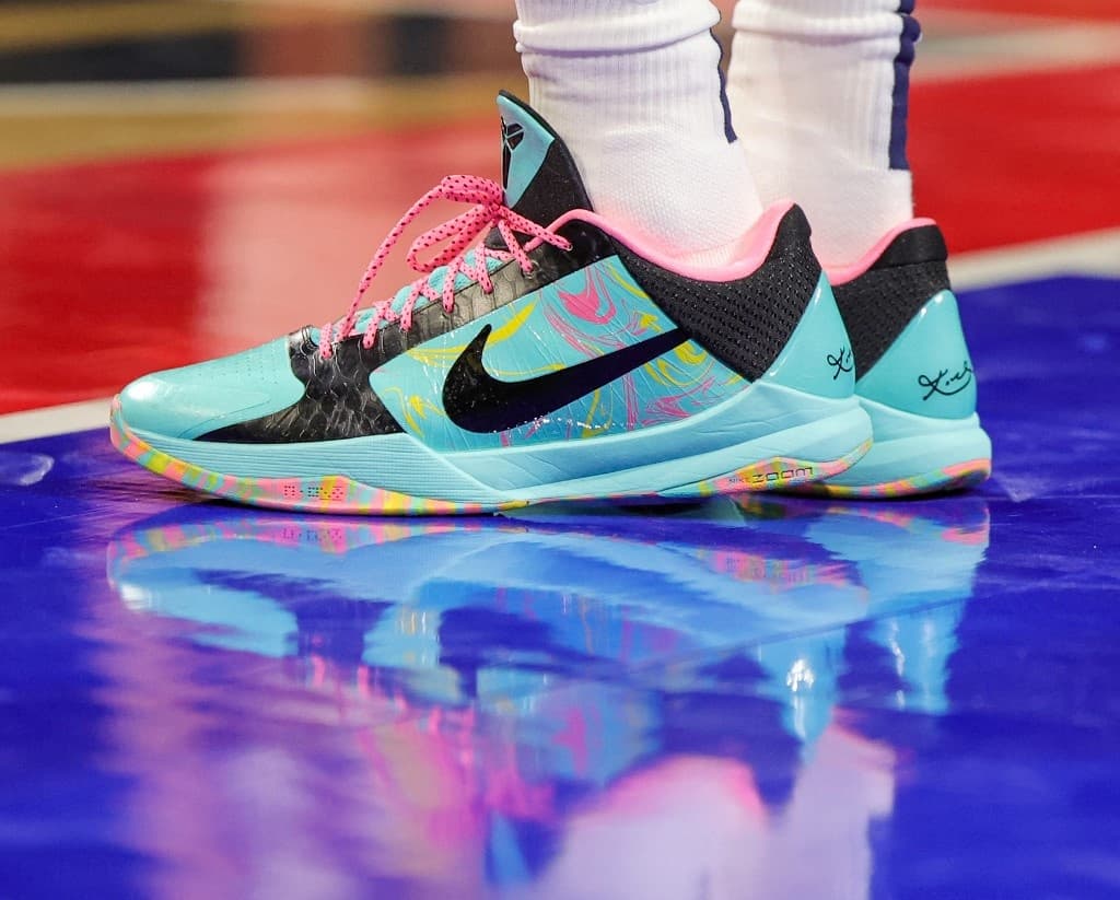 Nike shares tumble as it cuts costs amid 'softer' outlook