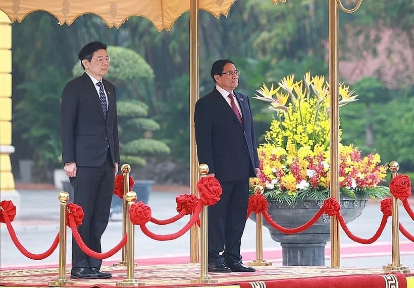PM hosts official welcome ceremony for Singaporean counterpart