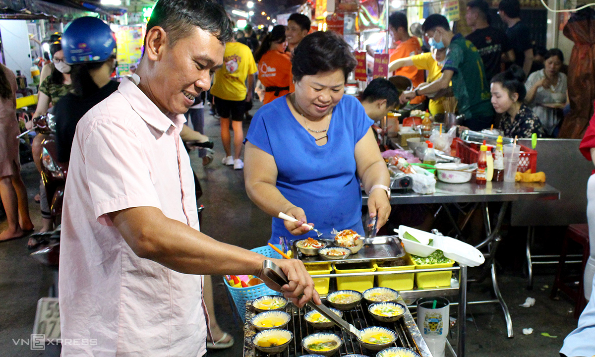 Street food paradise at Saigon flower market