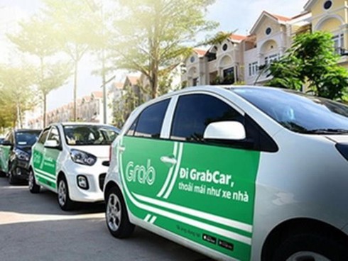 Grab cars must have TAXI light-box or logo